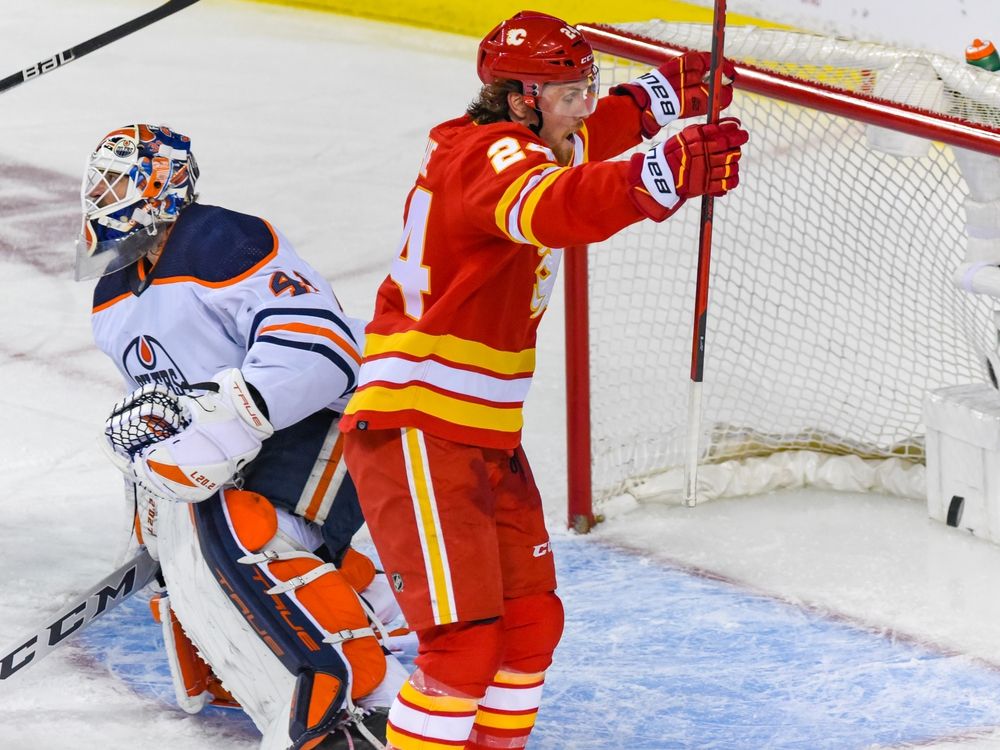 The Calgary Flames' Brett Ritchie scores against Edmonton Oilers goalie Mike Smith during their second-round playoff series at Scotiabank Saddledome on May 18.