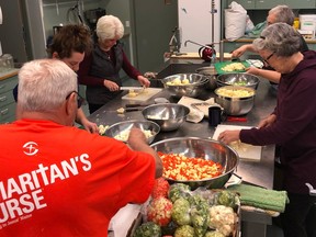 Volunteers prepare food for people affected by the B.C. floods in 2021.