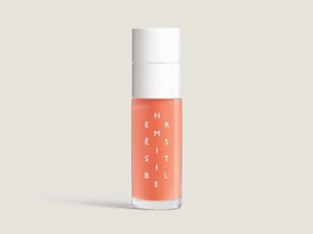 Hermes Beauty Hermesistible lip oil.