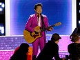 Simu Liu on stage at the 2022 JUNO Awards Broadcast at Budweiser Stage on May 15, 2022 in Toronto.