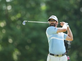 Canadian Adam Hadwin plays his shot from the 14th tee during the first round of the PGA Championship at Southern Hills Country Club in Tulsa, Oklahoma.