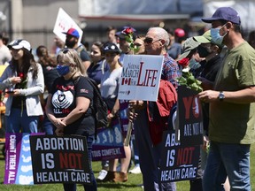 People take part in 'March For Life' on Parliament Hill in Ottawa on Thursday, May 12, 2021.