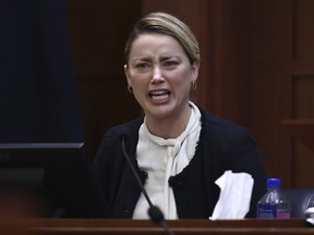 Amber Heard testifies in the courtroom at the Fairfax County Circuit Court in Fairfax, Va., Thursday, May 5, 2022.