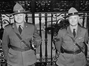 B.C. Provincial Police officers shortly before the force was disbanded in 1950. Ditching the RCMP and returning to a provincial force would cost hundreds of millions.