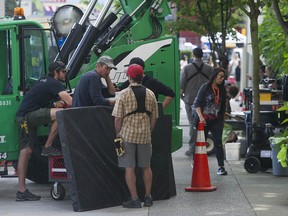 Cast and crew on the set of Deadpool 2 filming underneath the Granville Street Bridge in Vancouver on Aug. 16, 2017.