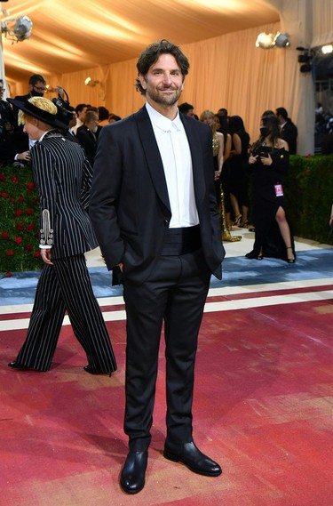 Actor Bradley Cooper arrives for the 2022 Met Gala at the Metropolitan Museum of Art on May 2, 2022, in New York. - The Gala raises money for the Metropolitan Museum of Art's Costume Institute. The Gala's 2022 theme is "In America: An Anthology of Fashion."