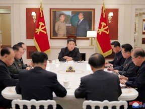 This picture taken on May 17, 2022 and released from North Korea's official Korean Central News Agency (KCNA) on May 18 shows North Korean leader Kim Jong Un (C) attending a meeting of the Presidium of the Political Bureau of the Central Committee of the Workers' Party of Korea (WPK) in Pyongyang. (Photo by KCNA VIA KNS / AFP) / - South Korea OUT / ---EDITORS NOTE--- RESTRICTED TO EDITORIAL USE - MANDATORY CREDIT "AFP PHOTO/KCNA VIA KNS" - NO MARKETING NO ADVERTISING CAMPAIGNS - DISTRIBUTED AS A SERVICE TO CLIENTS
THIS PICTURE WAS MADE AVAILABLE BY A THIRD PARTY. AFP CAN NOT INDEPENDENTLY VERIFY THE AUTHENTICITY, LOCATION, DATE AND CONTENT OF THIS IMAGE. /