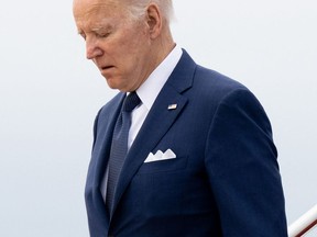 US President Joe Biden disembarks from Air Force One upon arrival at Joint Base Andrews in Maryland, May 24, 2022, after returning from South Korea and Japan, his first trip to Asia as President.