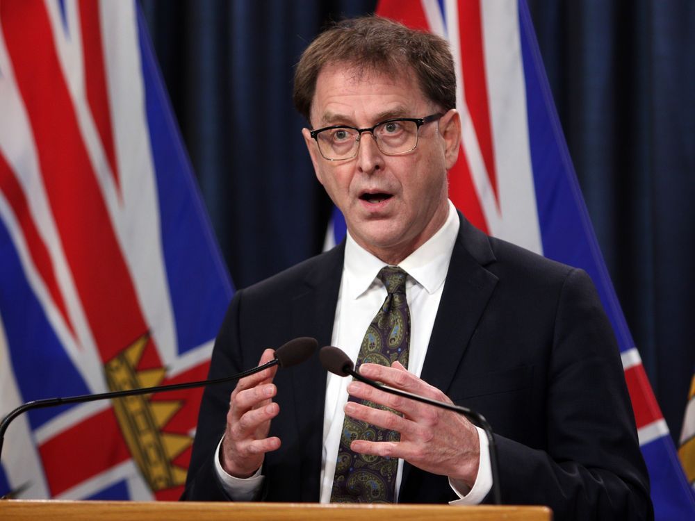 British Columbia Health Minister Adrian Dix speaks during a press conference in Victoria on Dec. 21, 2021. B.C. has launched the country's first provincewide lung cancer screening program for residents who are at high risk of getting the disease.