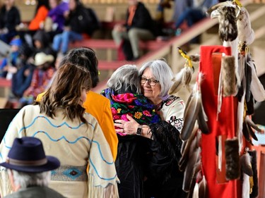 Canada's Governor General Mary Simon is embraced at a memorial event marking the first anniversary of the discovery of unmarked Indigenous child graves at the Tk'emlups Pow Wow Arbour in Kamloops, B.C., May 23, 2022.
