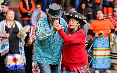 Minnie Kendra of Nskonlith dances with Skwelcampt at a memorial event marking the first anniversary of the discovery of unmarked Indigenous child graves at the Tk'emlups Pow Wow Arbour in Kamloops, British Columbia, Canada May 23, 2022. REUTERS/Jennifer Gauthier