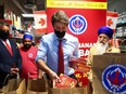 Canadian Prime Minister Justin Trudeau meets with volunteers at the Guru Nanak Food Bank in Surrey on May 24, 2022.