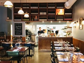 The dining area at Collective Goods Bistro and Grocer on Commercial Street is newly renovated but has the feel of a lived-in, not-so-minimalist Shaker dining room.