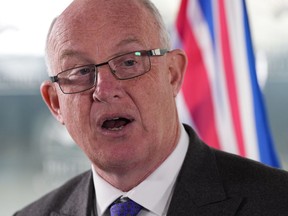 B.C. Deputy Premier and Minister of Public Safety and Solicitor General Mike Farnworth speaks during a news conference in Vancouver, B.C., Monday, April 11, 2022. Farnworth says an automated alert system will be in place in June to notify residents of dangerously high temperatures like last year's fatal heat dome.