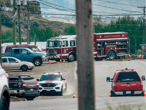 First responders, including police, Kamloops Fire Rescue and the BC Ambulance Service are seen at the corner of Carrier Street and Athabasca Street East in the Mount Paul Industrial Park just before noon on Thursday, May 26. An ammonia leak was reported in the area around 11 a.m., with eight taken to hospital.Dave Eagles/KTW