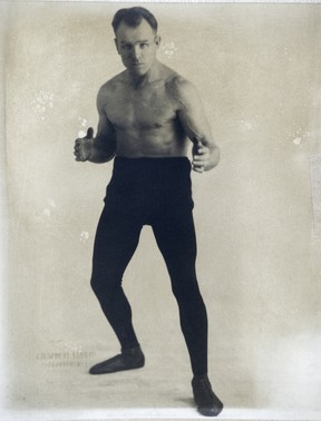 Jack Strong in a classic wrestling pose.  He doesn't look fat, as Sun sports editor Andy Little suggested.