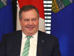 Jason Kenney makes remarks to media and Alberta government cabinet members prior to a meeting in Calgary on Friday.