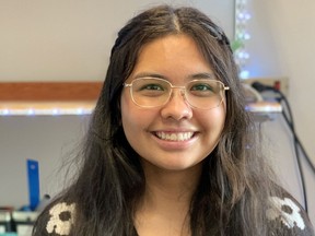 Nisga’a Keona St. Louis, 18, said having a schoolbook written by an Indigenous author is “really cool.” The Charles Hays Secondary senior and fellow students in her social justice class have been learning about Indigenous issues from First Nations 101 by Ts’msyen author Lynda Gray. Photo credit: Danielle Dueck
