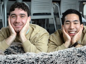 University of British Columbia entrepreneurs Noah Silverman (left) and Yuki Kinoshita (right) in their Plufl, a dog bed for humans. Photo credit: Thandi Fletcher, UBC.