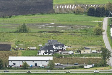 A home and building on the Sumas prairie in Abbotsford, May, 3, 2022. This is what the home looks like after almost 6 months after the flood in 2021.