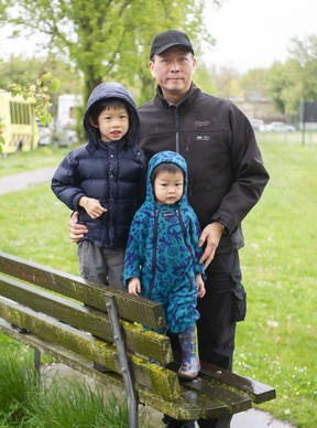 David Chen and his children Max, 6, and Guss, 2, in Vancouver, BC May 15, 2022.