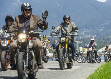 Well-dressed motorcyclists enjoy the weather at Brockton Point during the 11th Annual Distinguished Gentleman's Ride (DGR) in Vancouver, May 22, 2022.