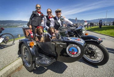 From left: Brisa, Sue and Brian Curzon with dogs Kai and Kona of 2 Brown Dogs Sidecar Adventures join other well-dressed motorcyclists at Brockton Point for the 11th Annual Distinguished Gentleman's Ride (DGR) in Vancouver, May 22, 2022.