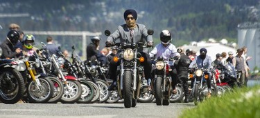 Well-dressed motorcyclists enjoy the weather at Brockton Point during the 11th Annual Distinguished Gentleman's Ride (DGR) in Vancouver, May 22, 2022.