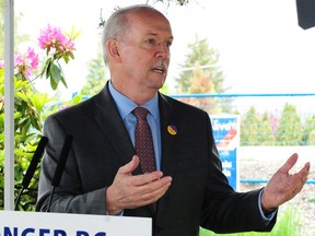 Prime Minister John Horgan speaks at a press conference to announce the start of construction on the new Burnaby Hospital in Burnaby BC on May 30, 2022.