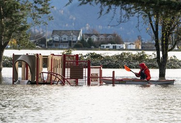 BEFORE: Owen Dececco paddles to a playground structure in Delair Park in Abbotsford, Nov., 17, 2021.