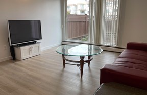 The living room of a Richmond apartment priced at $199,000.