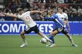 May 14, 2022; Vancouver, British Columbia, CAN; Vancouver Whitecaps forward Lucas Cavallini (9) reaches for the ball against San Jose Earthquakes defender Francisco Calvo (80) during the first half at BC Place. Mandatory Credit: Anne-Marie Sorvin-USA TODAY Sports