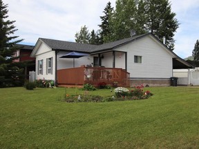 This three-bedroom home on a corner lot in Tumbler Ridge is priced at $183,000. (Zealty.ca)