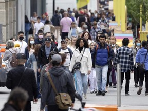 Crowds returned to Montreal's Ste-Catherine St. by early June.