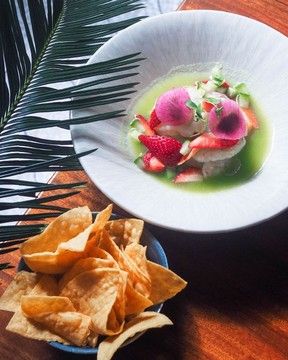 Dried shrimp and scallops with avocado, strawberries, red onion and jalapeno lime broth.