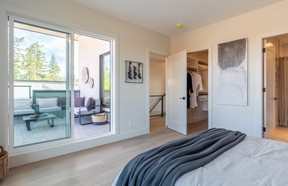 A bedroom with a deck in the Duo show suite.