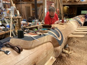 Gwaai Edenshaw works on a totem pole in Haida Gwaii.