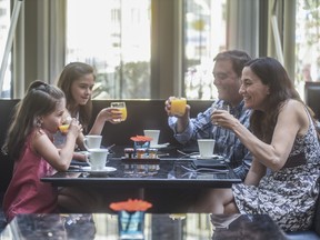 A family enjoys breakfast at the InterContinental Toronto Centre. INTERCONTINENTAL TORONTO CENTRE