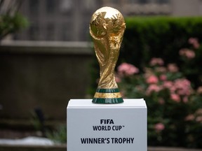 The FIFA World Cup trophy is displayed during an event in New York.