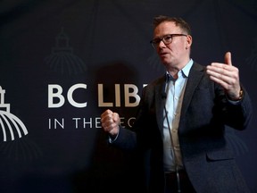 B.C. Liberal Leader Kevin Falcon gives a statement and answers questions from reporters during an media availability at the legislature in Victoria, B.C., on Wednesday, May 4, 2022.
