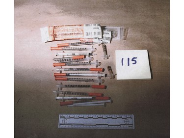 Fifteen used syringes found inside a backpack, which contained several items linked by DNA to Pickton's friend Dinah Taylor. Pickton's brother Dave gave the backpack to police. Photos introduced as evidence in the trial of Robert Pickton.