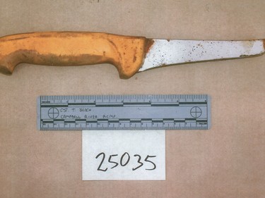 Eleven-inch knife with a broken blade seized from a shelf inside a building on the Picktons' Burns Road property. Photos introduced as evidence in the trial of Robert Pickton.