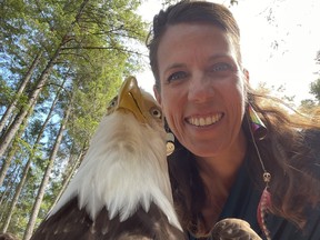 Pam McCartney, a volunteer with Growls, a wildlife rescue society on Gabriola Island. She is pictured here with a stuffed eagle she calls Edie, which is used to teach people about eagles.