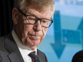 Commissioner Austin Cullen meets with reporters after releasing his report from his inquiry into money laundering in BC, in Vancouver on June 15.