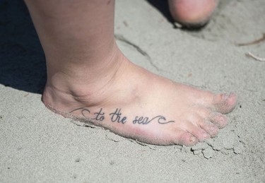 A tattoo on the foot of Marcie Callewaert, an educator at the Cedar Coast Field Station on Vargas Island near Tofino, B.C. The station offers researchers, students and others the opportunity to live off-grid.