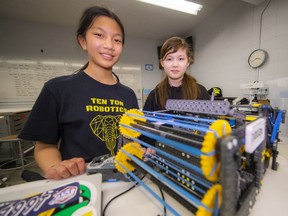 Annie Zhang (left) and Gloria Collins, both Grade 6 students at Ridgeview elementary in West Vancouver, with their award-winning robot.