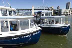 Ferries carry passengers to and from Granville Island Friday, June 24, 2022.