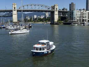 Ferries carry passengers to and from Granville Island Friday, June 24, 2022.