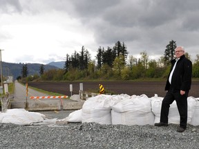 Abbotsford Mayor Henry Braun at the location of some of the temporary repairs to  the Sumas dike. One element of the new plan is permanent repairs.