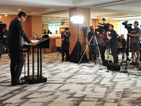 BC attorney general David Eby responds to Commissioner and former associate justice Austin Cullen as he provides a brief overview of The Commission of Inquiry into Money Laundering in B.C. in Vancouver, BC., on June 15, 2022.